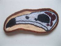 a beaded raven skull.